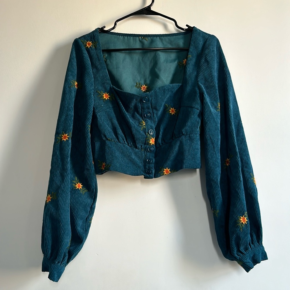 Blue button up blouse with yellow flowers